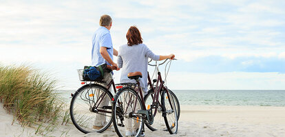 Cyklister på stranden - Fano Bikes