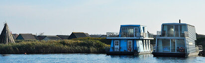 themes/esmark_meltdown/gfx/ferienhauser-daenemark/hausboote-in-hvide-sande-top.jpg