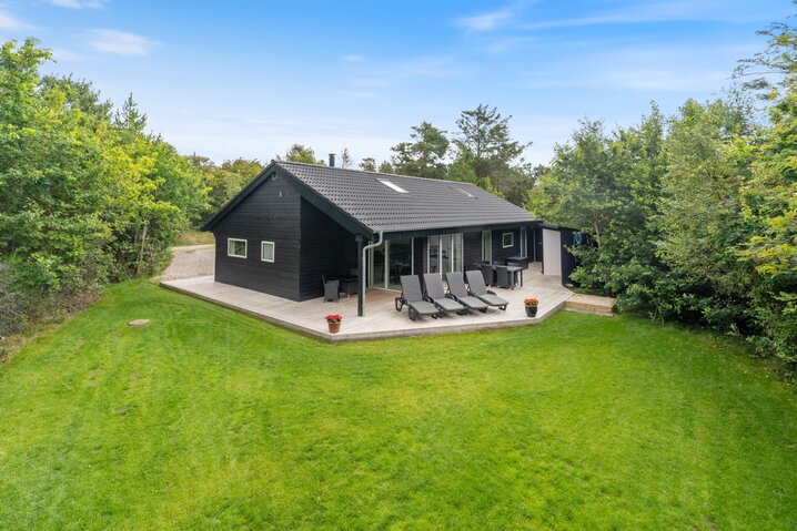 Sommerhus KK1041 på Fyrrealle 16, Lodbjerg Hede - Billede #0